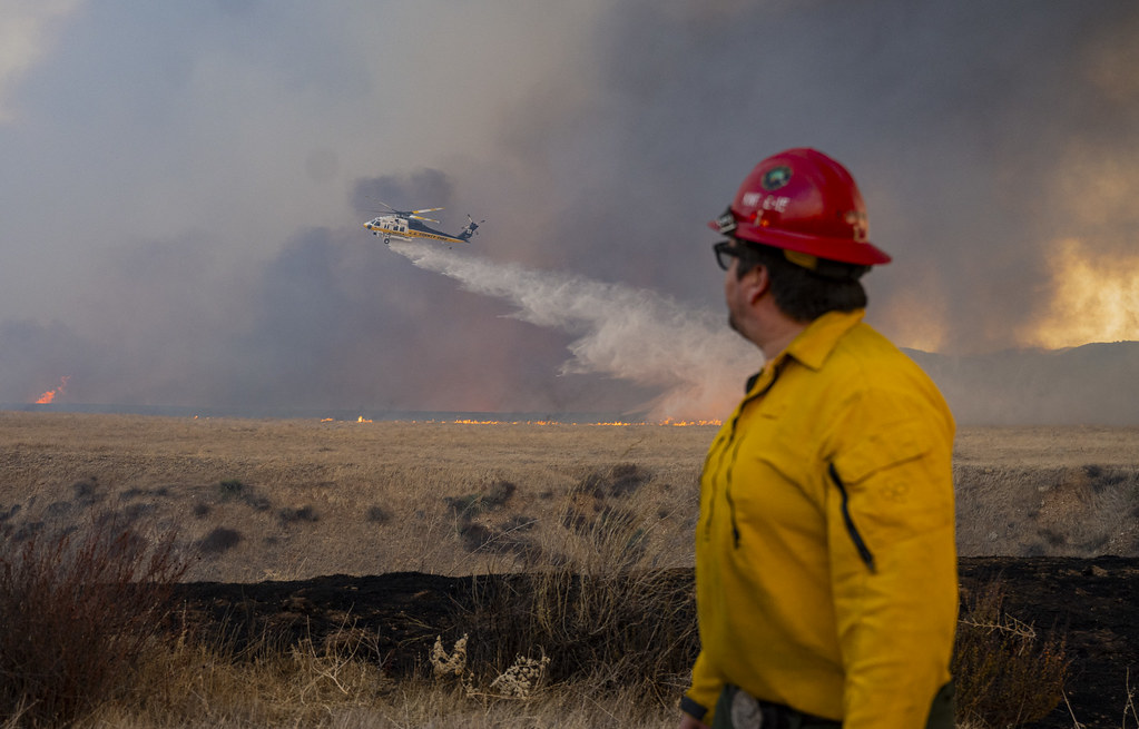 Firefighters attempt to contain the Hughes fire which burned over 10000 acres.